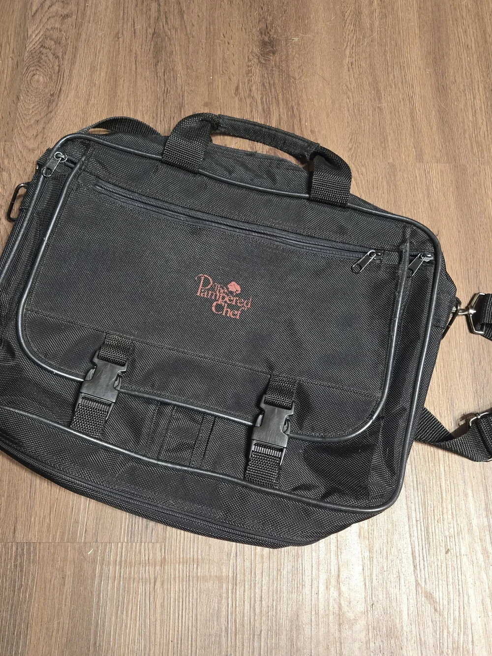 The Pampered Chef Black Serveware Travel Case And Serving Wares.